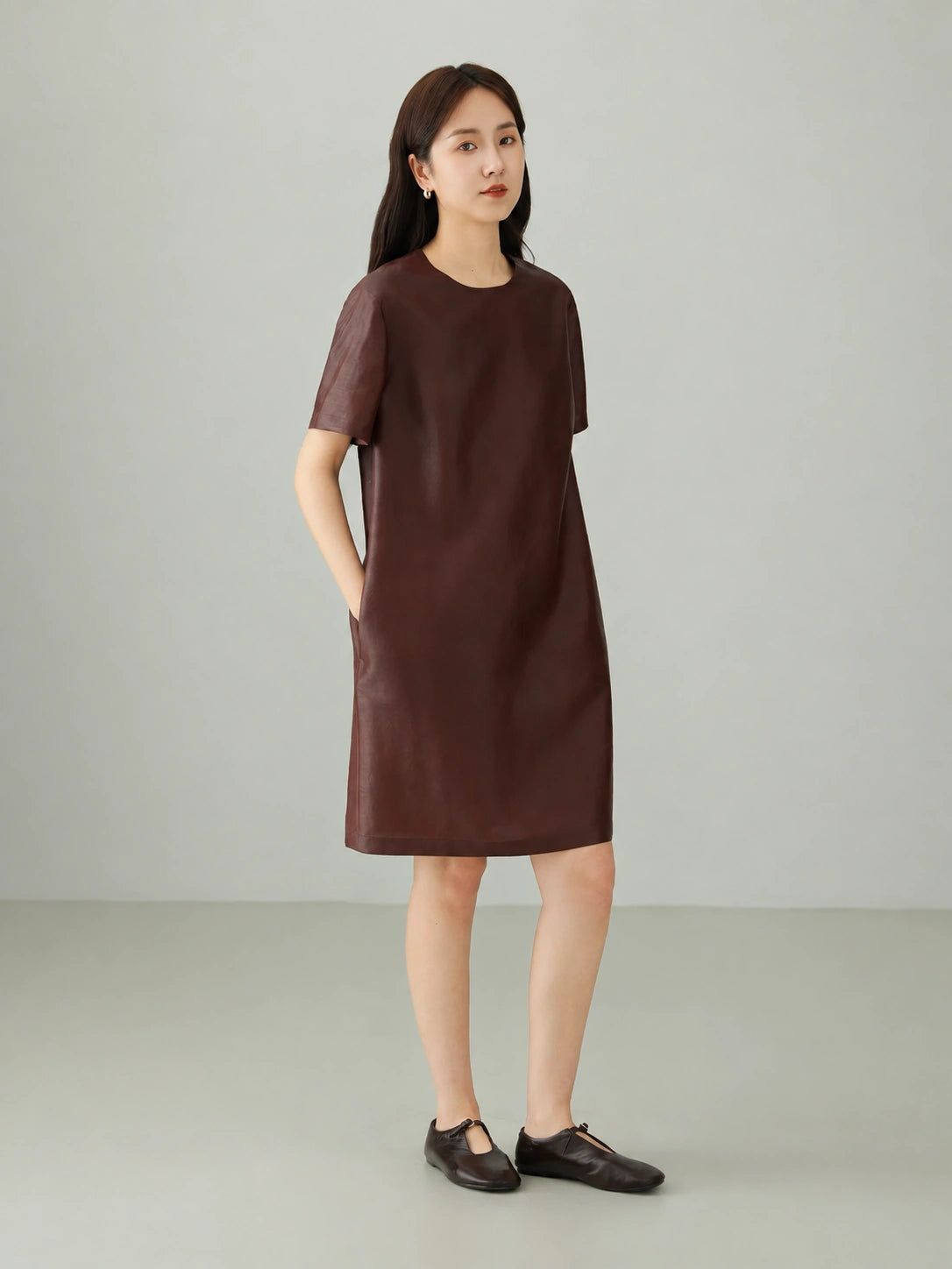 Burgundy red Xiangyunsha silk dress featuring a loose comfortable fit, elegant short sleeves and natural silk texture, side view