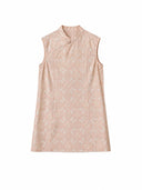 Front view flat lay of the dress showing the Mandarin collar, a single traditional button, and the intricate light pink and blue jacquard pattern.