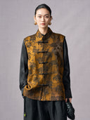 Front detail of the antique gold floral jacquard vest with pockets and frog-button fastening