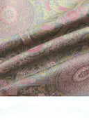 Draped Badayun Song brocade silk fabric showing its textured weave and soft pastel colors