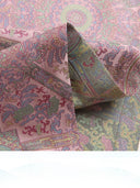 Detailed view of woven Song brocade fabric with repeating geometric medallions and floral motifs