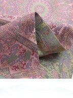 Detailed view of woven Song brocade fabric with repeating geometric medallions and floral motifs