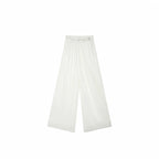 Flat lay of Beige pleated wide-leg pants with a delicate floral embroidered waistband, crafted from 100% polyester.