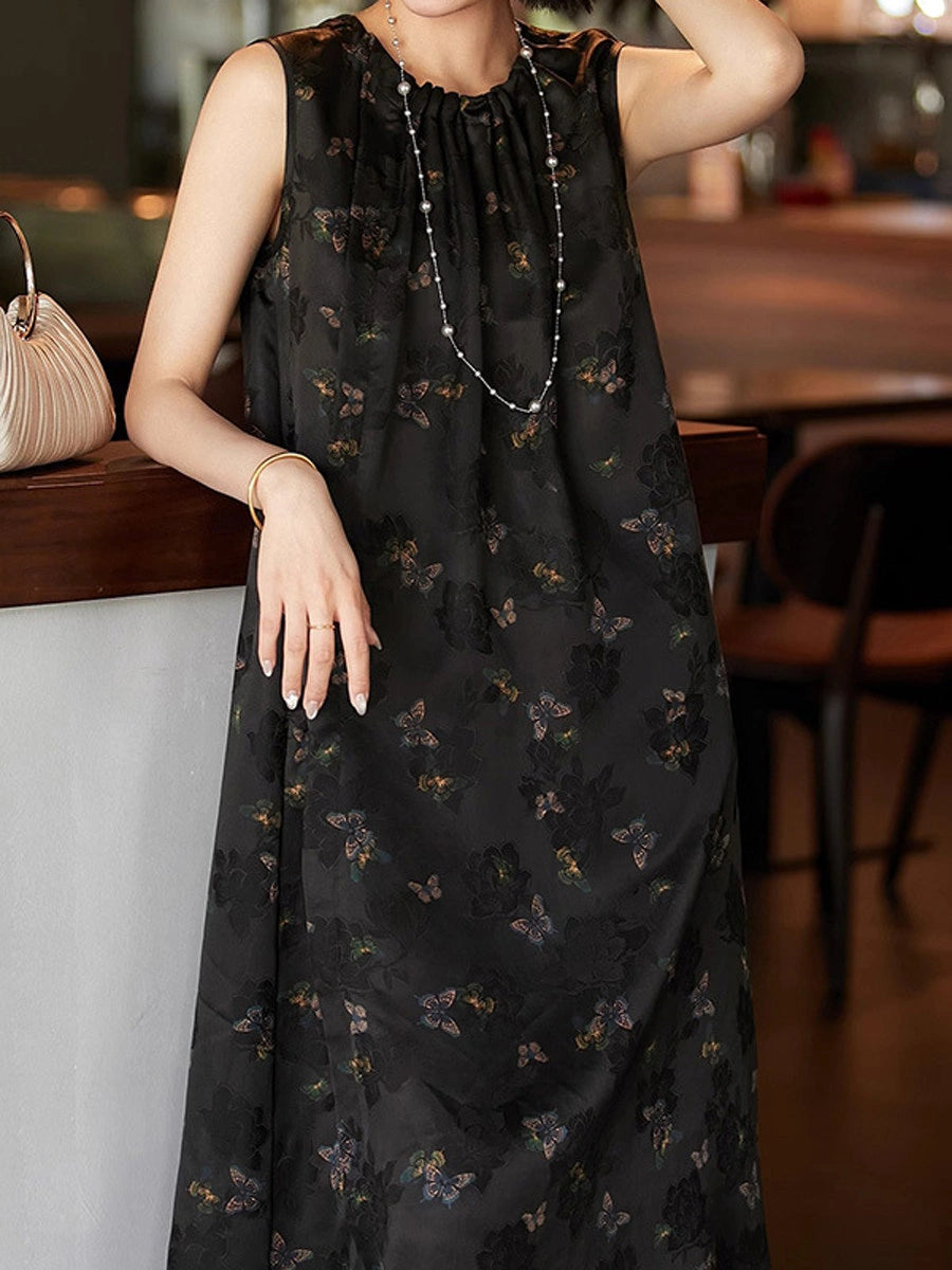Woman wearing a black butterfly-print Xiangyunsha silk sleeveless dress with a gathered neckline