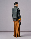 Back view of the black crackle Gambiered silk jacket with embroidered bee motifs
