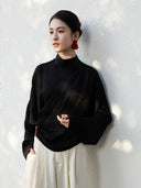 Black Cross-Over Mandarin Collar Blouse in a modern oriental design.
