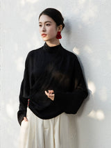 Black Cross-Over Mandarin Collar Blouse in a modern oriental design.