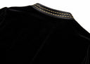 Detail of the round collar with fine gold stitching