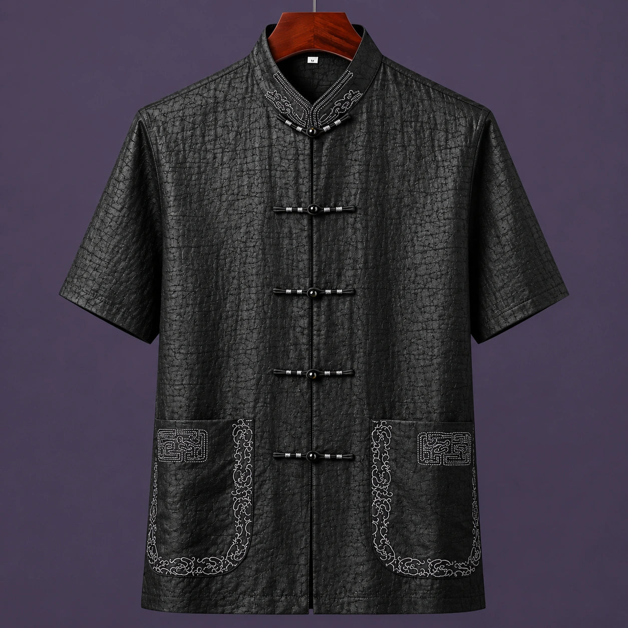 Black embroidered 100% mulberry silk men's Mandarin collar shirt with traditional frog button closure.