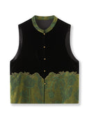 Front product view of a black silk-base velvet vest with green floral jacquard panels and gold-tone buttons.
