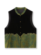Front product view of a black silk-base velvet vest with green floral jacquard panels and gold-tone buttons.