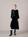 Black 100% mulberry silk embroidered midi dress with long sleeves and removable waist belt.