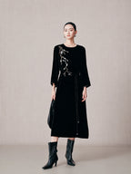 Black 100% mulberry silk embroidered midi dress with long sleeves and removable waist belt.