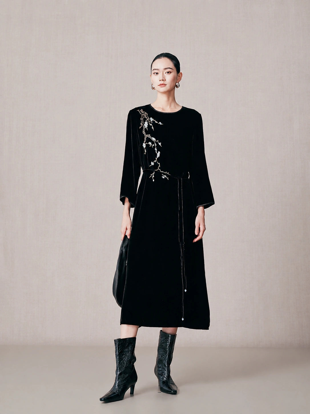 Black 100% mulberry silk embroidered midi dress with long sleeves and removable waist belt.