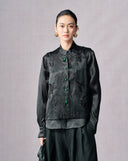 Front view of the black round-neck acetate vest with tonal phoenix embroidery