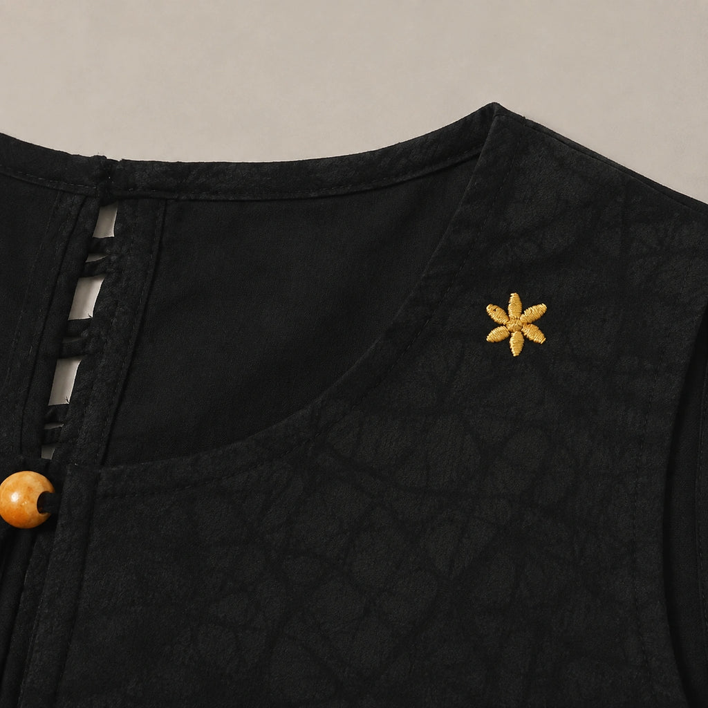 Detail of neckline and star embroidery on black mulberry silk Xiangyunsha dress