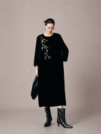 Women's black mulberry silk embroidered midi dress with relaxed silhouette and long sleeves.