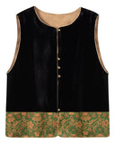 Front product view of the black velvet vest with a jade green and gold floral jacquard hem.