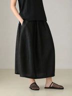 Black Xiangyunsha silk skirt with soft matte texture and modern oriental luxury style