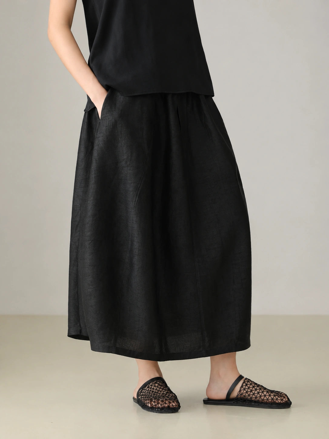 Black Xiangyunsha silk skirt with soft matte texture and modern oriental luxury style