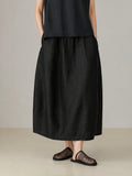 Black Xiangyunsha mulberry silk bubble skirt with elegant drape and minimalist oriental design
