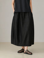 Black Xiangyunsha mulberry silk bubble skirt with elegant drape and minimalist oriental design