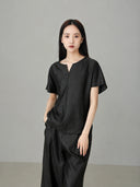 Black Xiangyunsha mulberry silk short sleeve top for women with minimalist Chinese-inspired design and elegant relaxed fit.