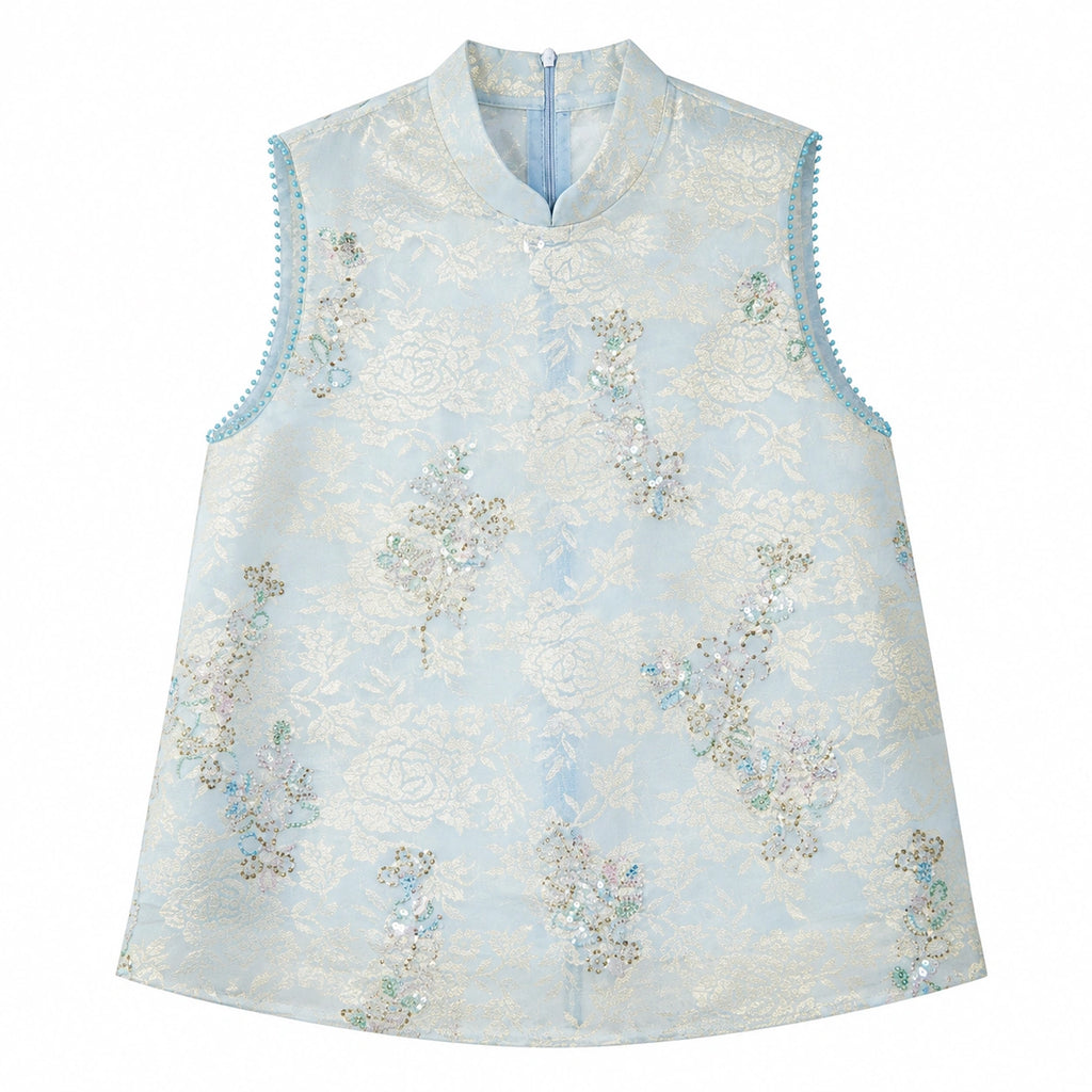 Flat lay of a light blue sleeveless Cheongsam vest with a mandarin collar, beaded edges, and intricate floral sequin embroidery, crafted from 100% polyester.