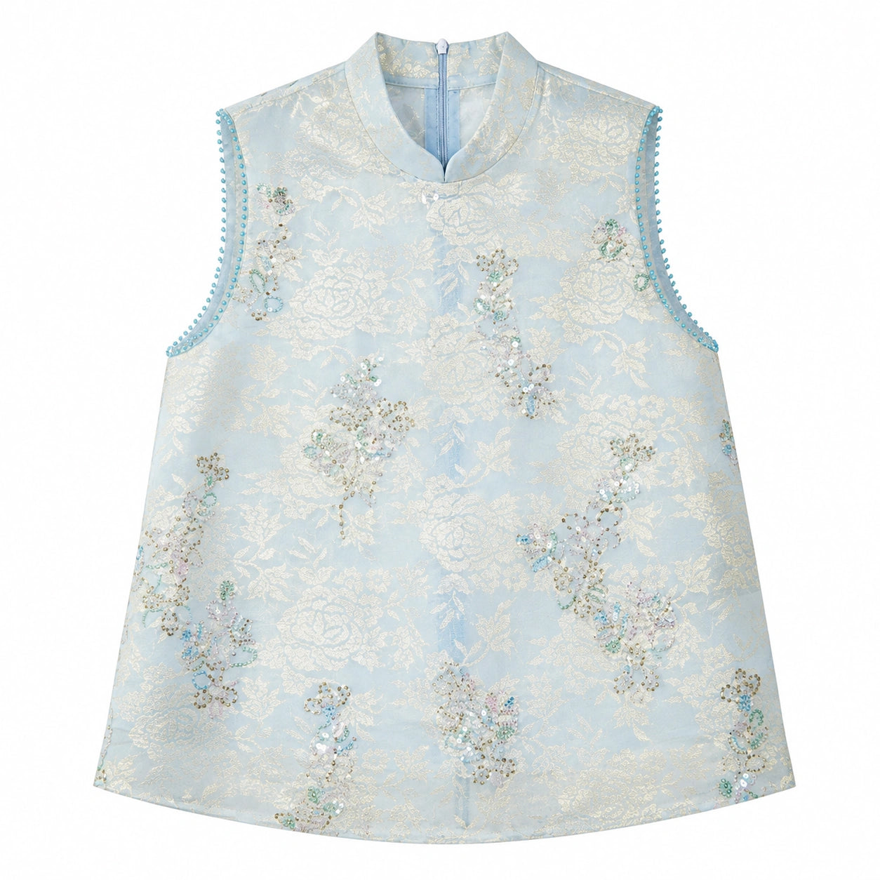 Flat lay of a light blue sleeveless Cheongsam vest with a mandarin collar, beaded edges, and intricate floral sequin embroidery, crafted from 100% polyester.