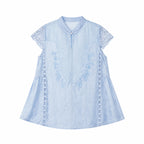 Flat lay of a blue lace-trimmed Cheongsam top with a mandarin collar, delicate floral embroidery, and short lace sleeves, crafted from 80% Viscose, 20% Polyamide.