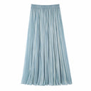 Flat lay of a blue pleated maxi skirt with an elastic waistband and full length, crafted from 80% Lyocell, 20% Polyester.