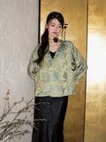 Front view of a bright blue and gold triacetate jacket with a V-neckline, button front, regular long sleeves, and a commuter-style silhouette.
