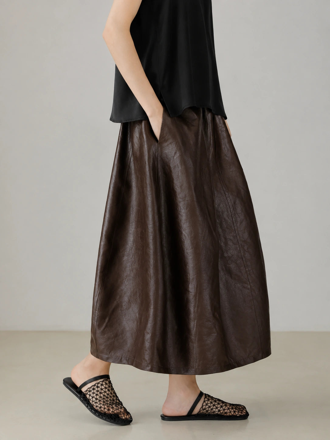 Burgundy Xiangyunsha silk skirt showing natural texture and sculptural bubble silhouette