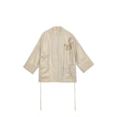 Front view of the champagne beige linen jacket with gold floral embroidery, wide cuffs and patch pockets