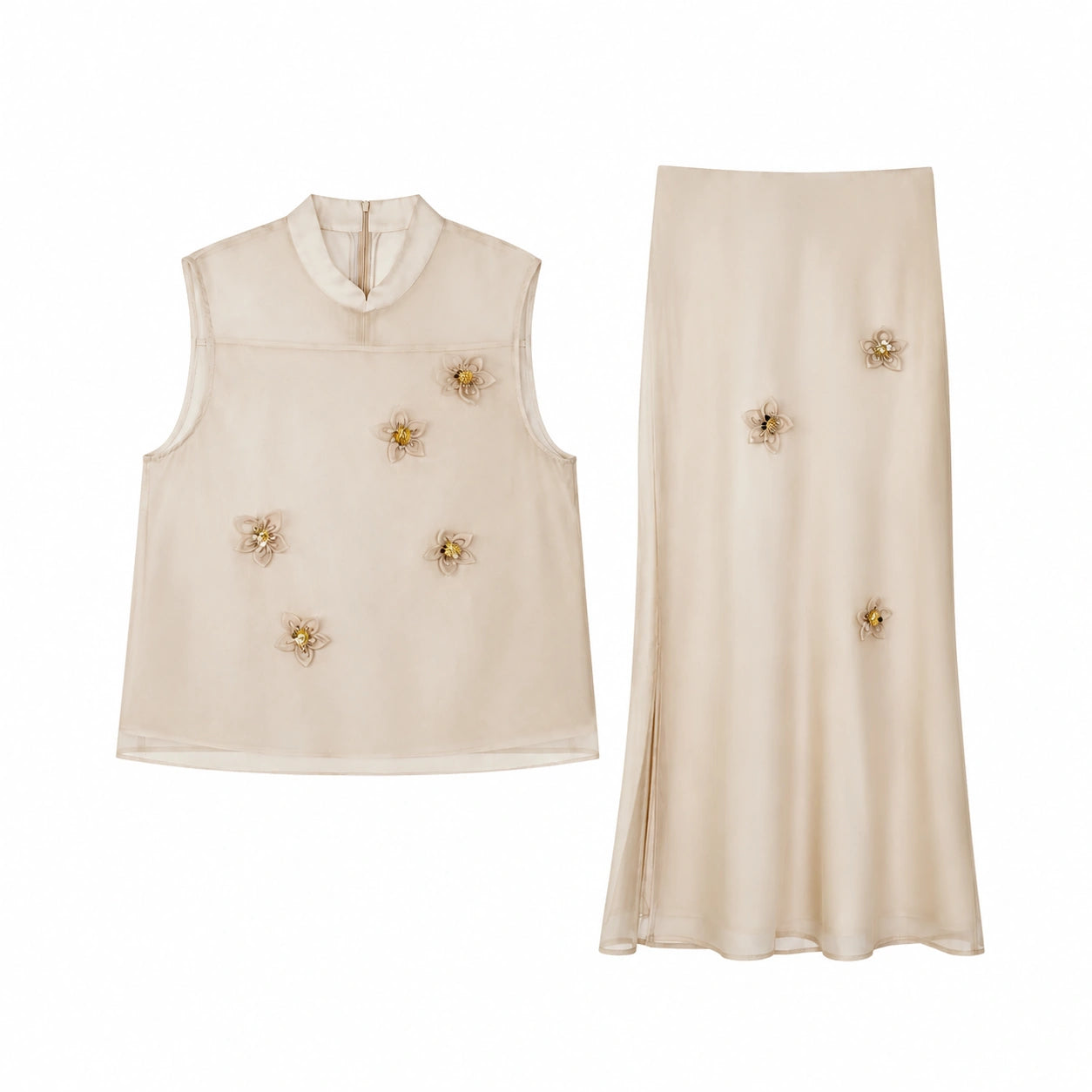 Flat lay of a champagne Cheongsam set featuring a sleeveless top with sheer yoke and a matching midi skirt with scattered 3D floral details.