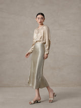 Elegant champagne mulberry silk blend blouse styled with a satin skirt