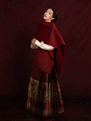 Chinese-style embroidered blouse and Mamian skirt styled with a shawl for formal occasions.
