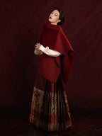 Chinese-style embroidered blouse and Mamian skirt styled with a shawl for formal occasions.