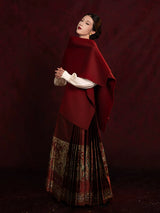 Chinese-style embroidered blouse and Mamian skirt styled with a shawl for formal occasions.