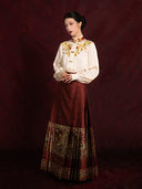 Elegant embroidered blouse paired with a pleated Mamian skirt for a refined Chinese-inspired look.