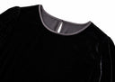 Close-up of the round neckline and softly gathered shoulder in black velvet