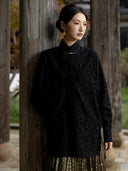 Model wearing the Jinyu Black textured shirt with a gold-tone collar closure.