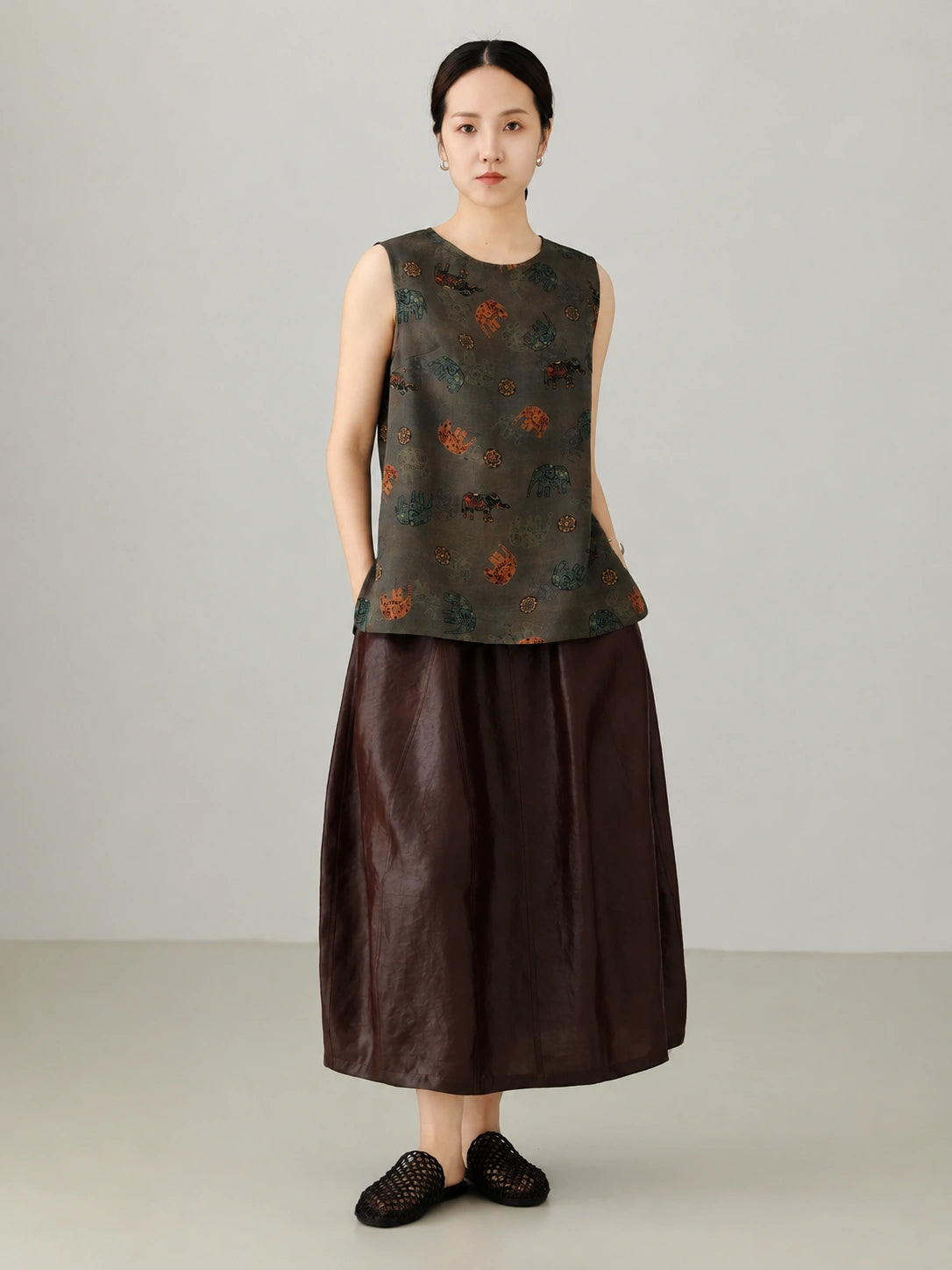 Dark grey Xiangyunsha mulberry silk sleeveless vest top with oriental elephant print design, modern Chinese style women's silk blouse