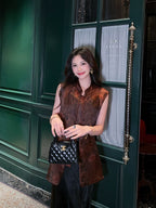 Close-up of a Dark Walnut Brown Mulberry Silk sleeveless vest highlighting the jacquard weave and Mandarin collar.