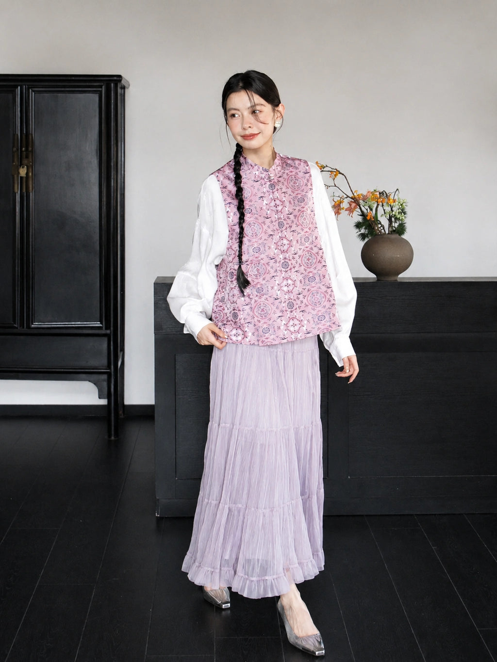 Full-body view of a 100% mulberry silk Chinese vest in dusty lavender, styled with a pale lavender tiered skirt.