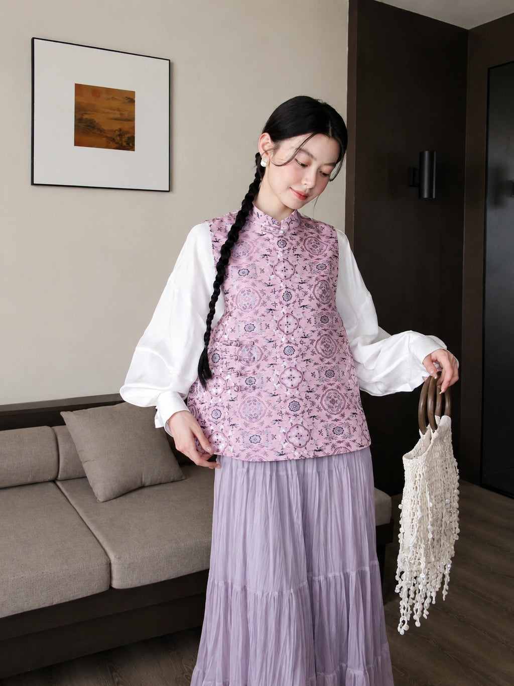 Model wearing a dusty lavender Songjin silk Chinese vest with a stand collar and Bao Xiang floral pattern.