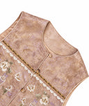 Product close-up showing the round neckline, piping and textured jacquard fabric.