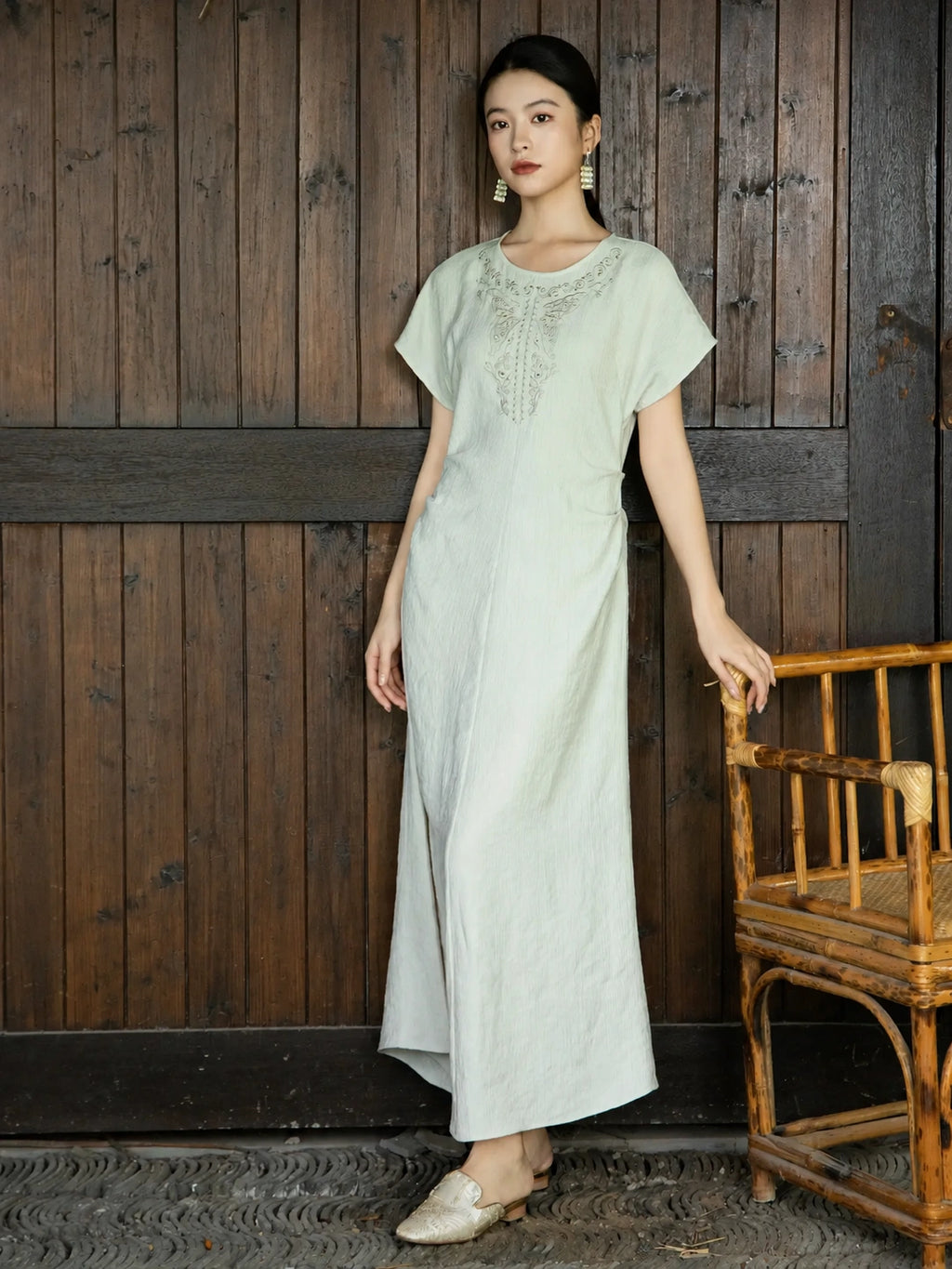 Women's embroidered relaxed maxi dress in light sage green with short sleeves and natural textured fabric by Gambiered Silk