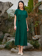 Emerald green jacquard viscose midi dress with adjustable waist tie.