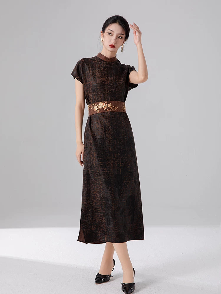 Woman wearing an espresso brown 100% mulberry silk jacquard maxi dress with a relaxed Oriental-inspired silhouette.